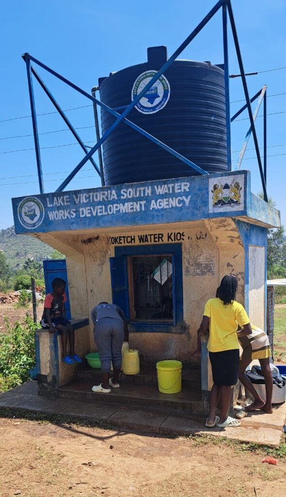 Nduta residents collect water from the newly connected water kiosk in Nduta community, Homa Bacy County, Kenya.Photo Credit: Susan Kanga
